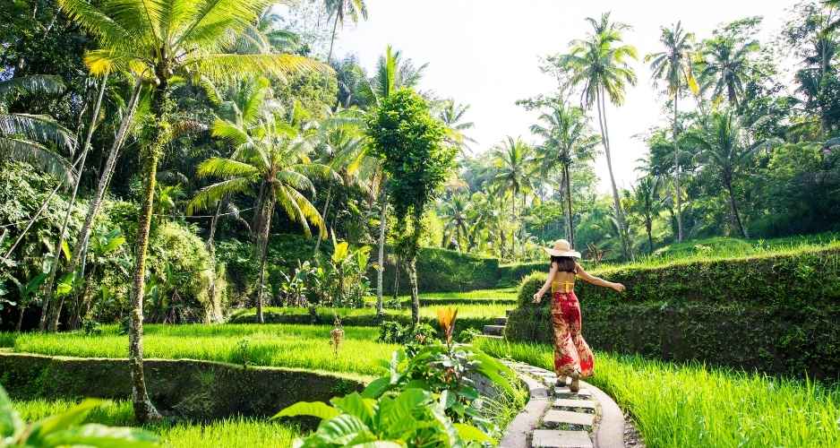 A vibrant community gathering at dusk in Bali