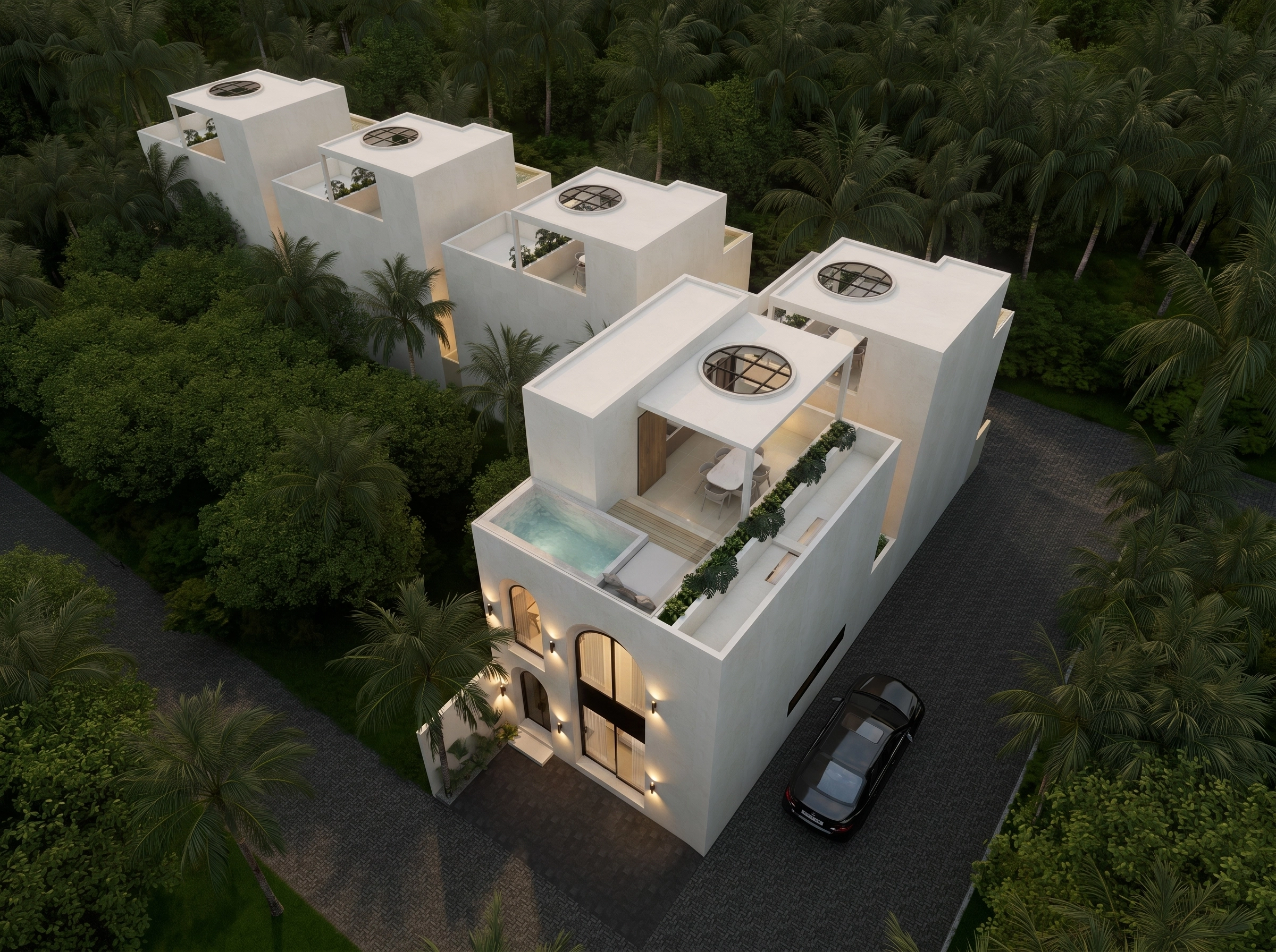 Aerial dusk view of 5-villa cluster