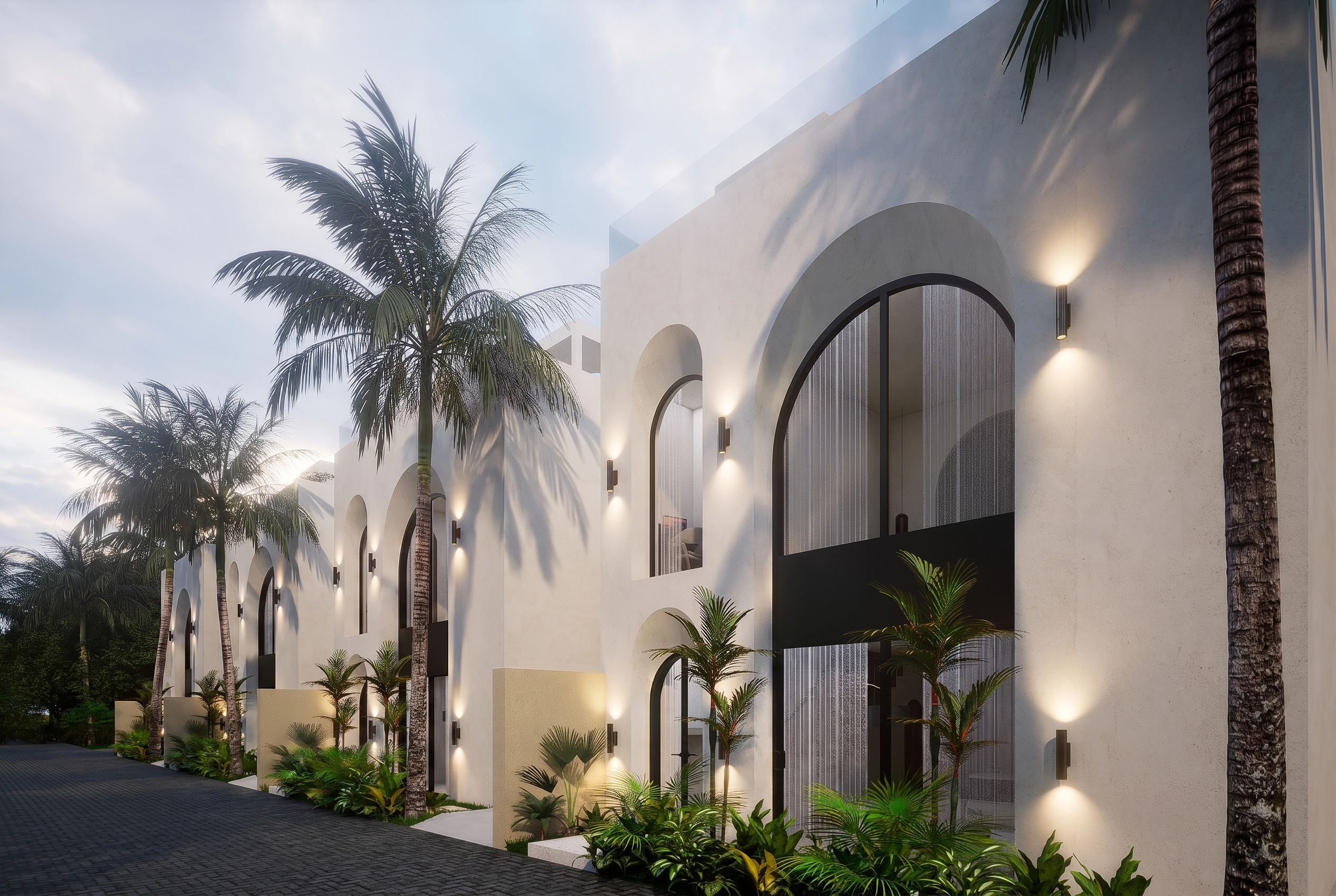 Angled facade with rhythmic arches at dusk