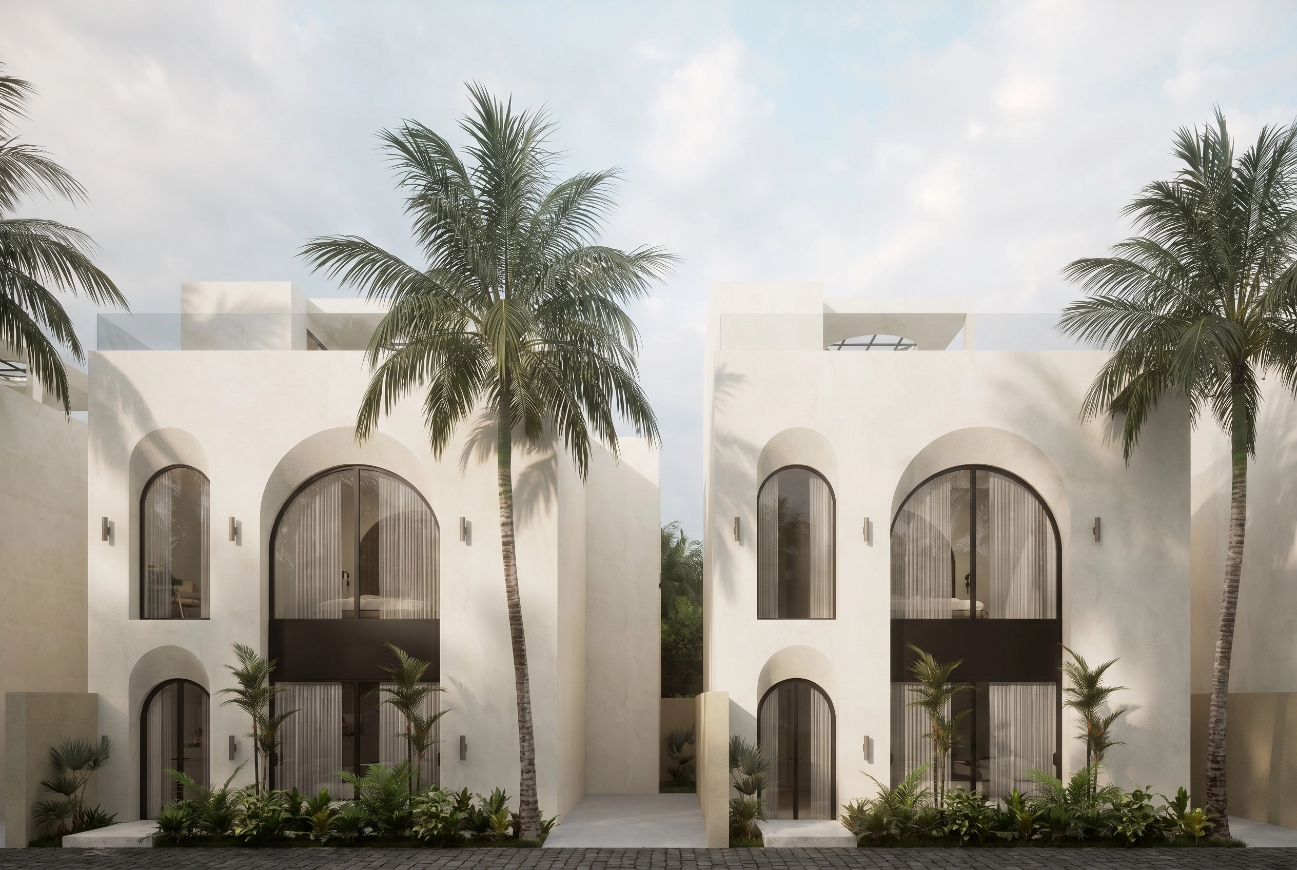 Daytime twin arched facade with palms