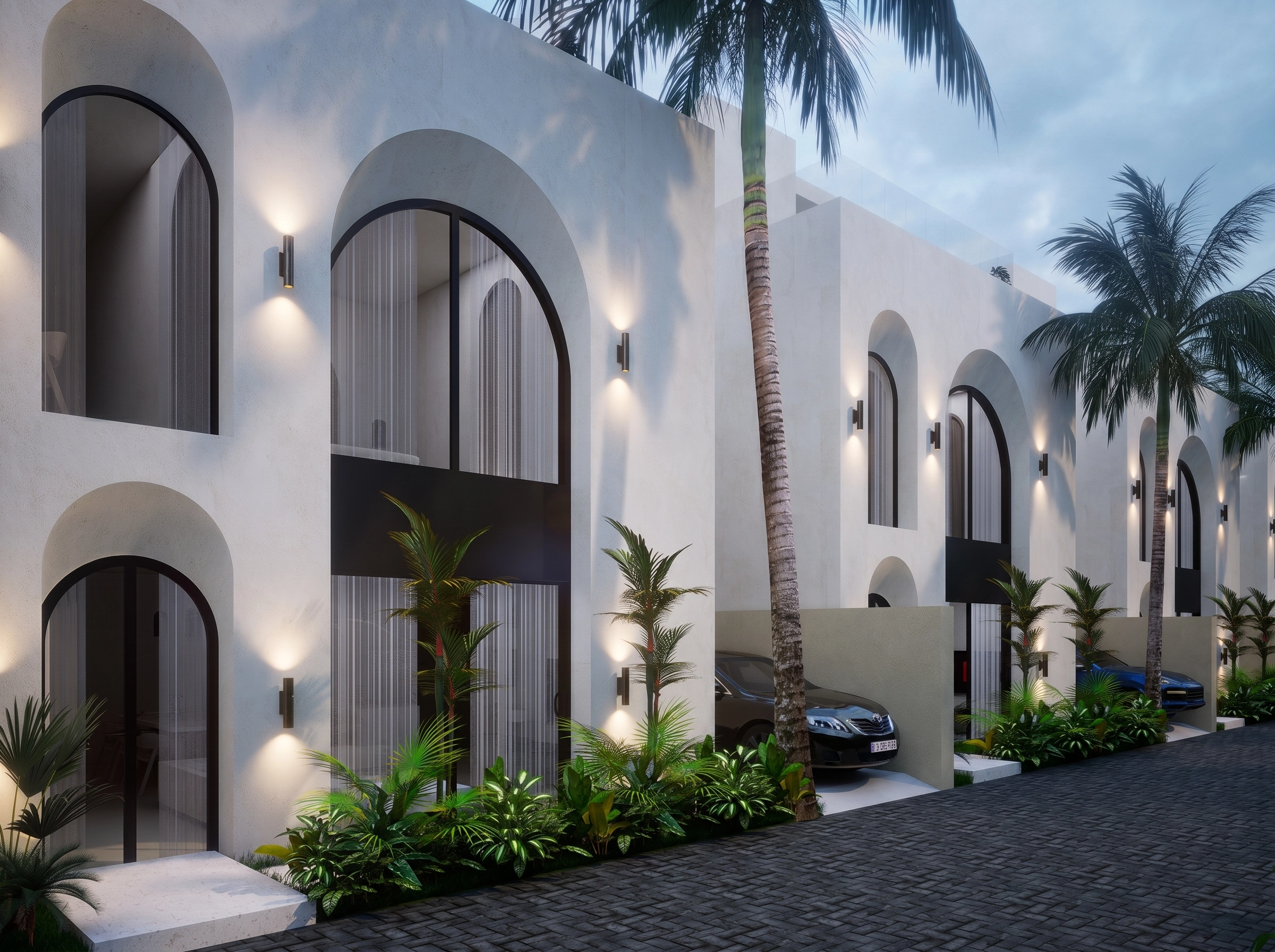 Row of villa arched facades at dusk
