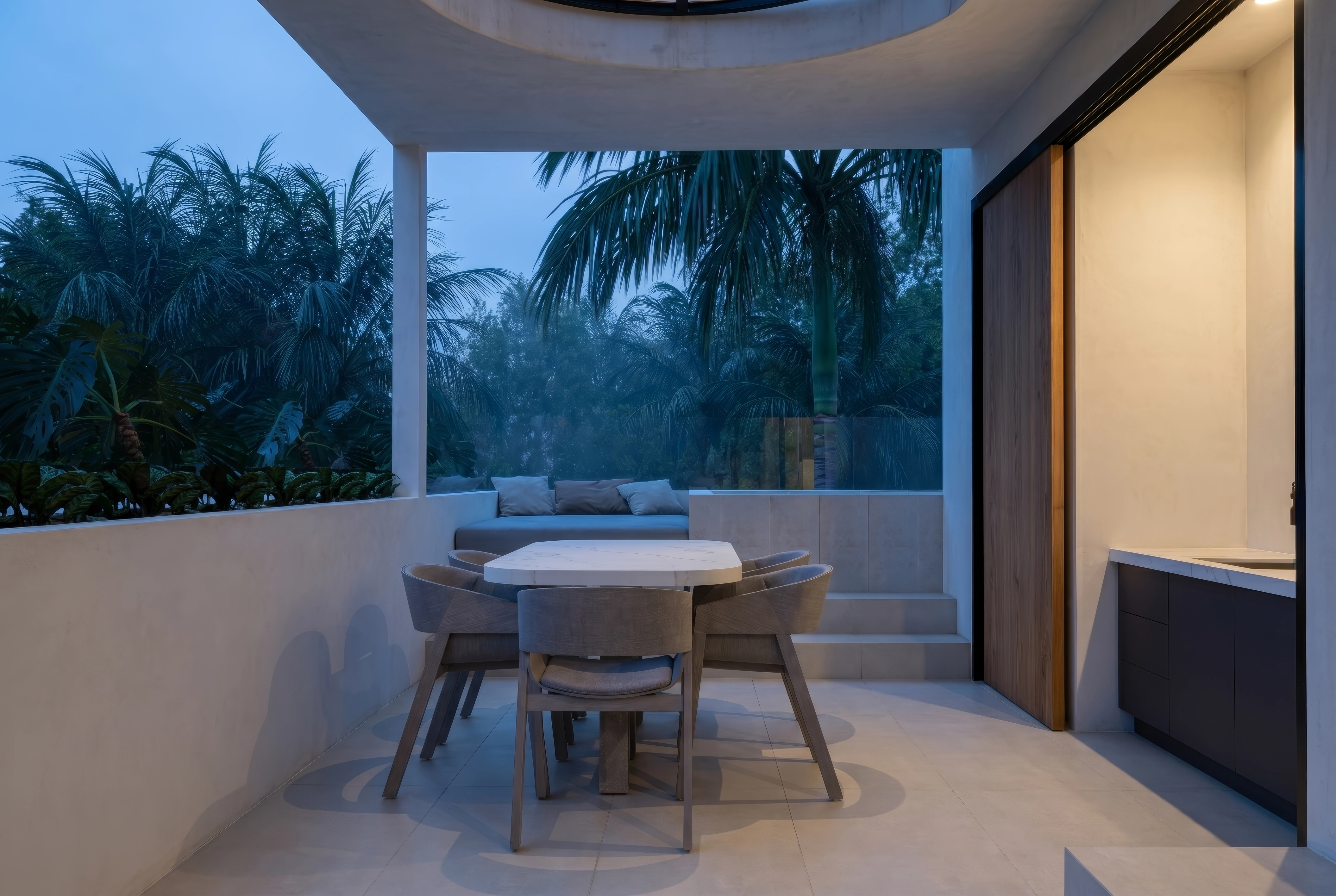 Unit 10/13, Rooftop covered dining nook at dusk