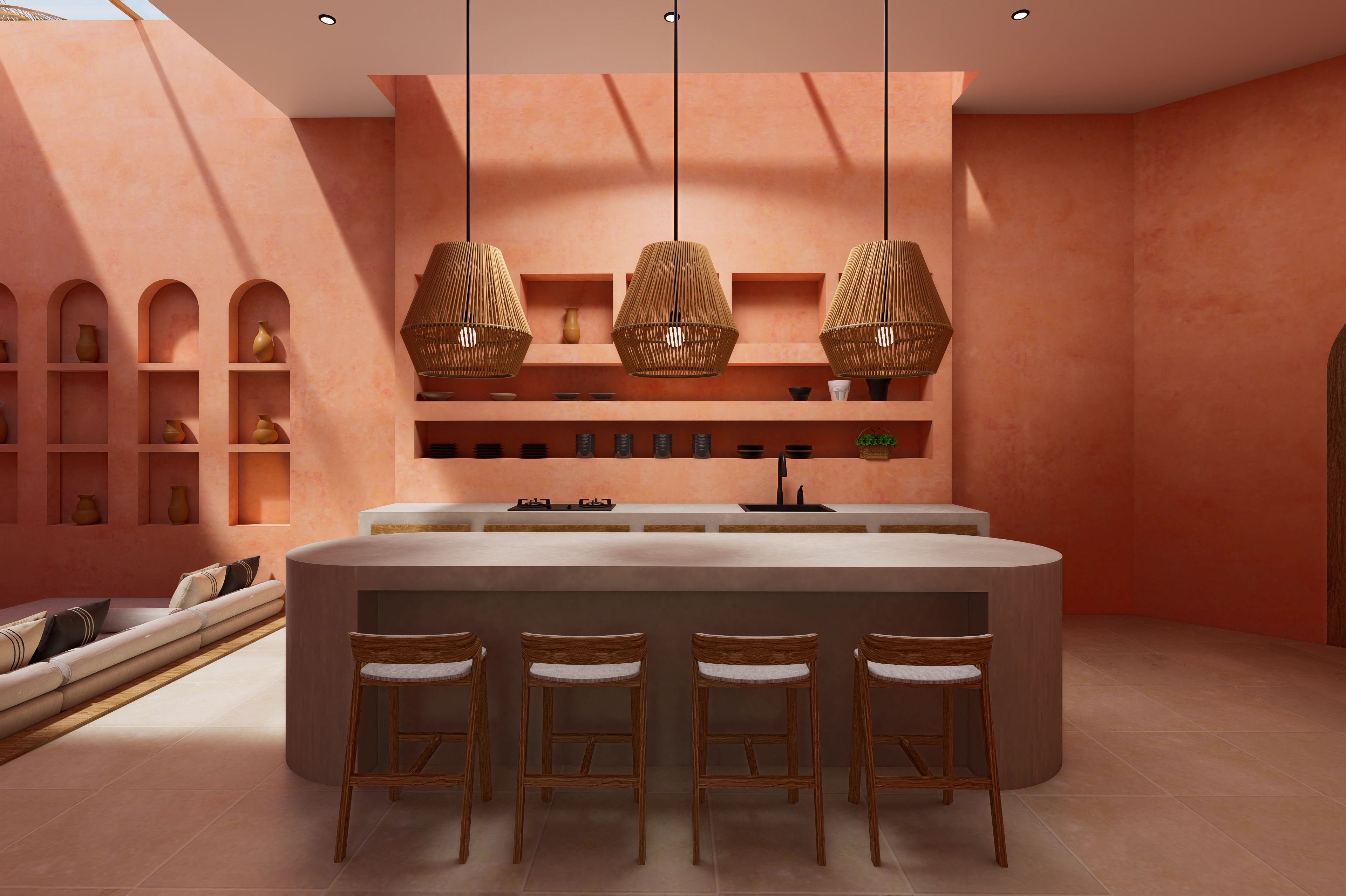 Modern kitchen with a large curved island, wooden bar stools, and three woven pendant lights