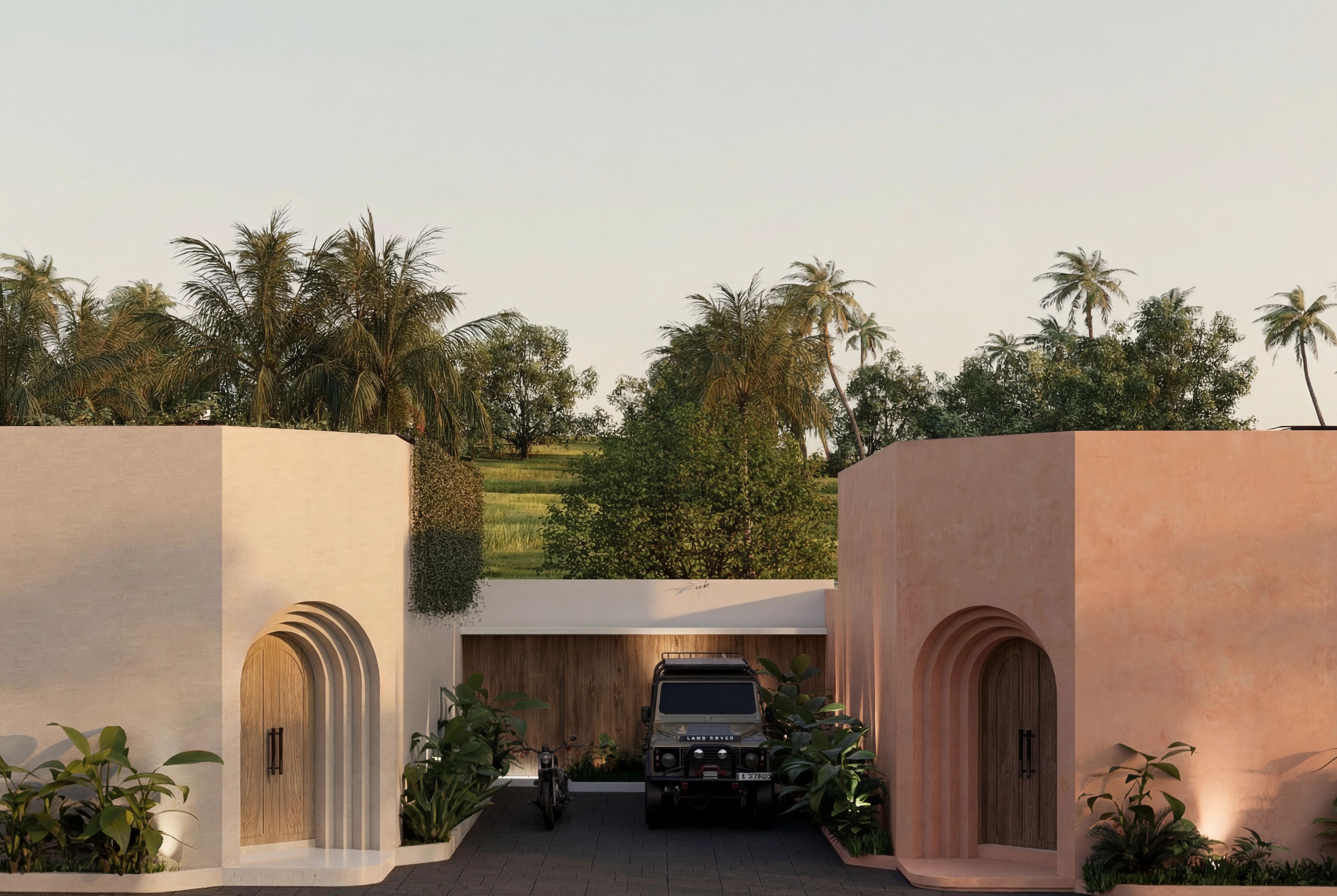 Villa carport and entrance showing parked vehicles between arched doorways